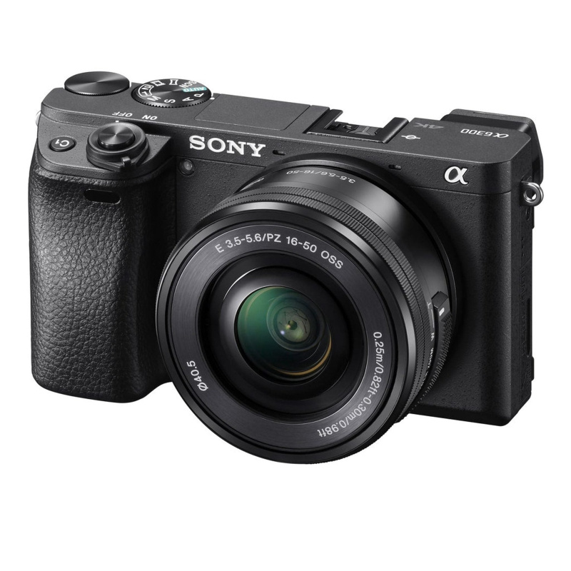 Sony Alpha a6300 Mirrorless Camera with 16-50mm Lens Black ILCE6300L/B With Soft Bag, Additional Battery, 64GB Memory Card, Card Reader , Plus Essenti